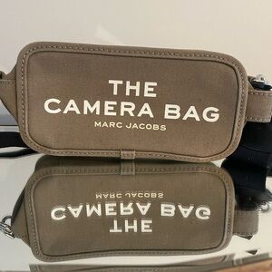 Marc Jacobs the camera bag.  Crossbody bag.